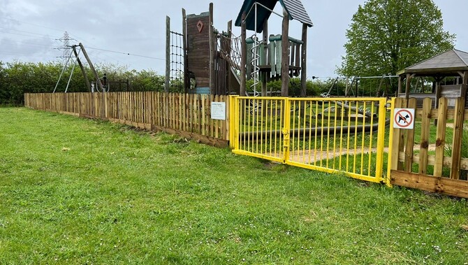 picket fencing around a playground in Oxfordshire